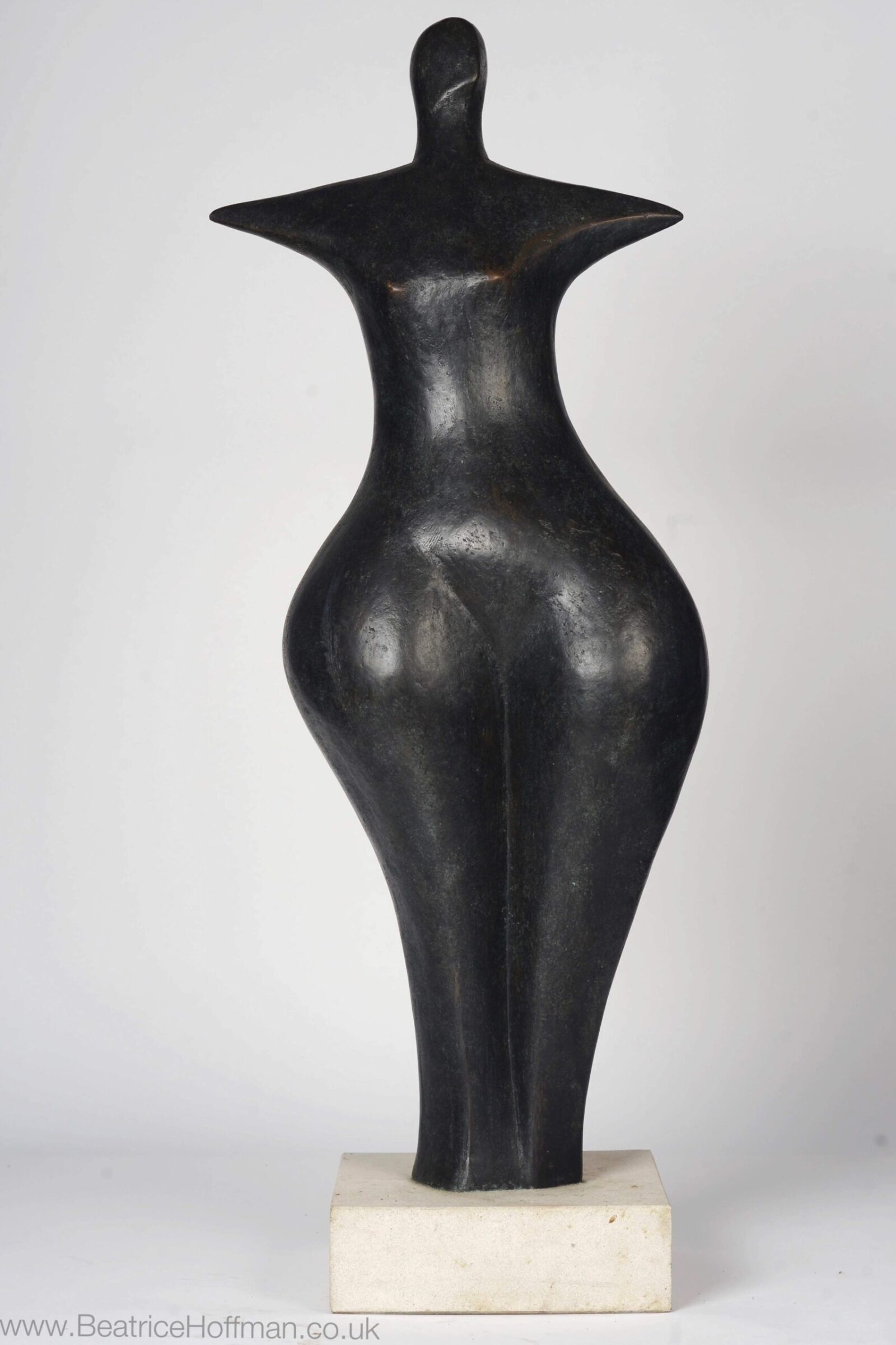 contemporary bronze sculpture of a standing abstract figure for garden or interior design