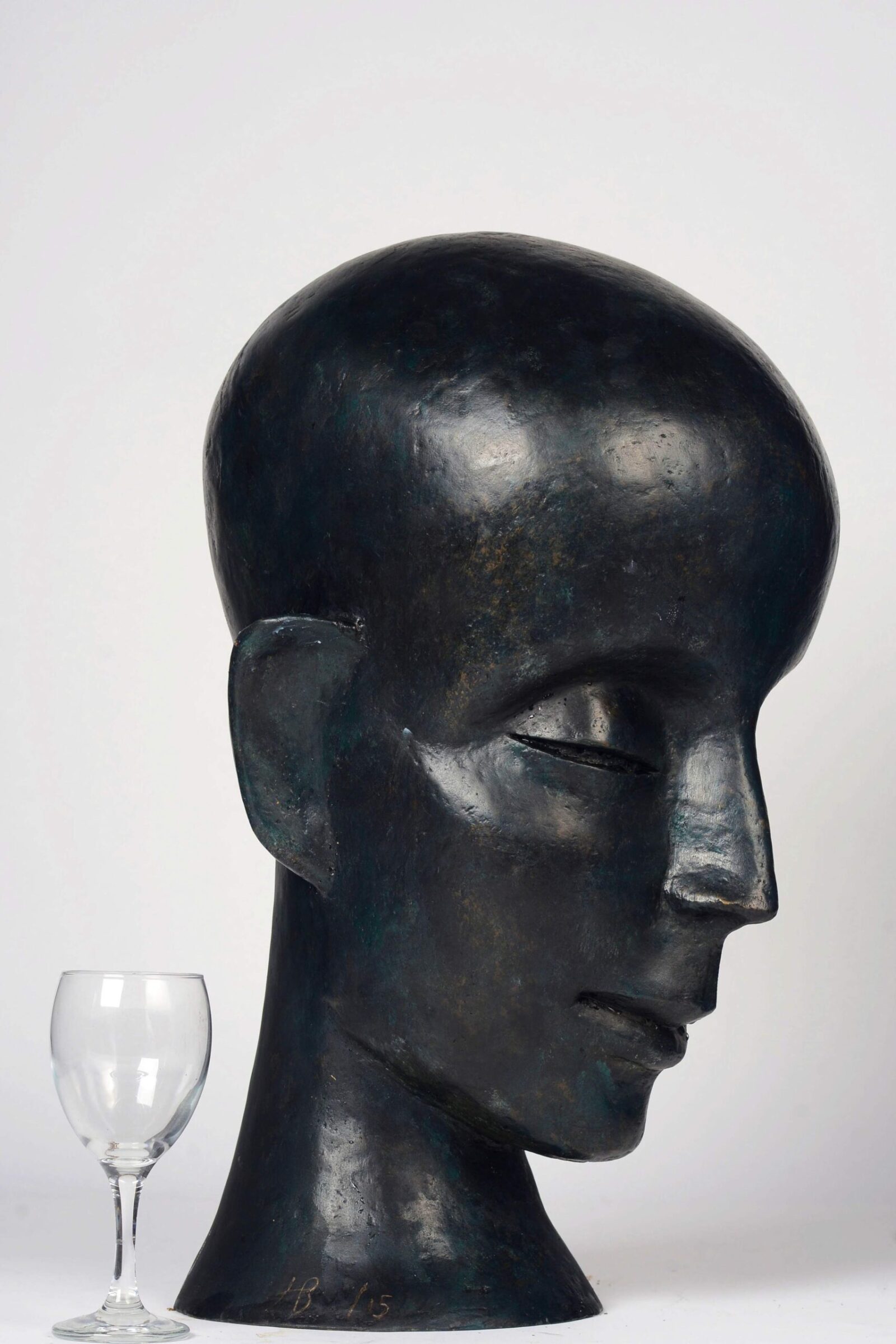 contemporary bronze sculpture of a buddha head