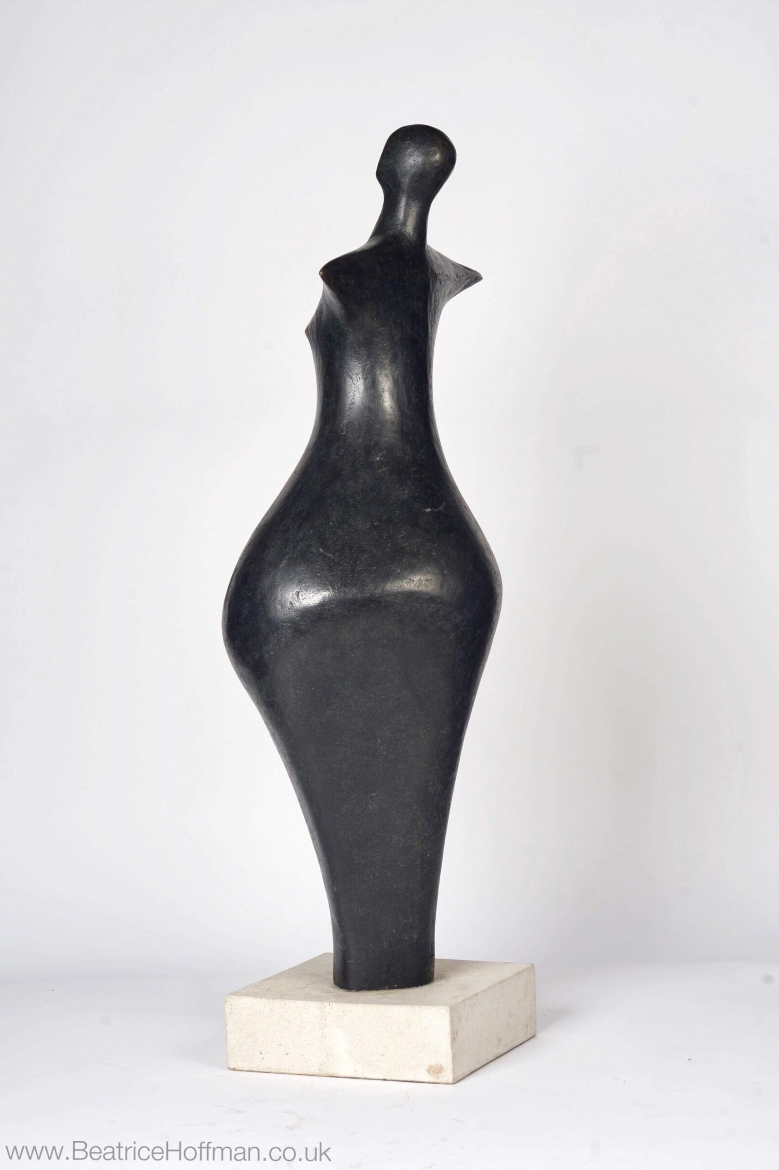 contemporary bronze sculpture of a standing abstract figure for garden or interior design