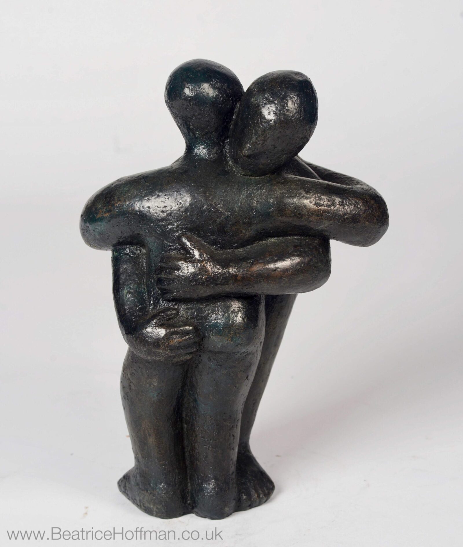 Modern affectionate bronze sculpture of a hug for a wedding anniversary