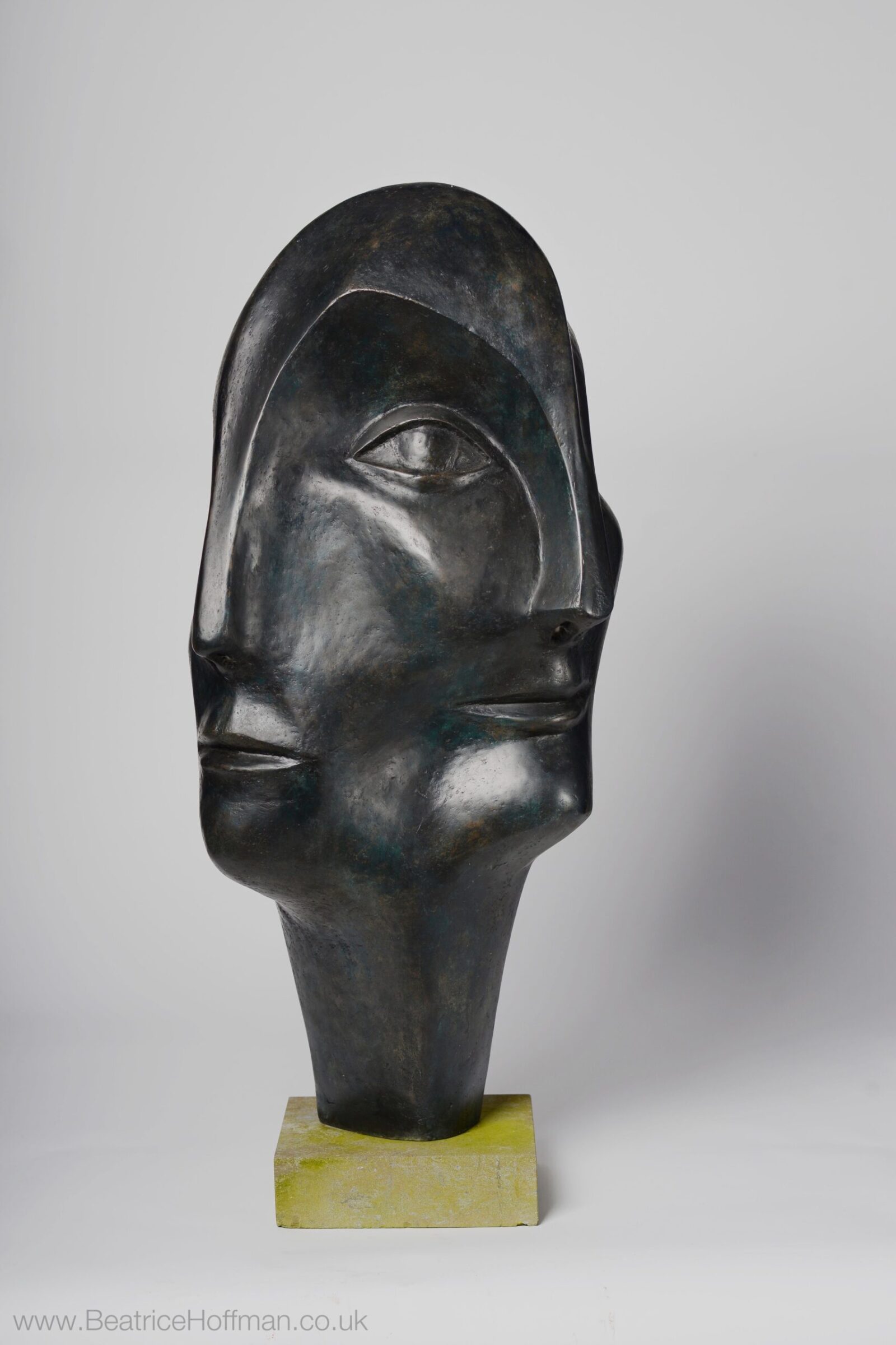 large contemporary garden bronze sculpture of a head based on Picasso