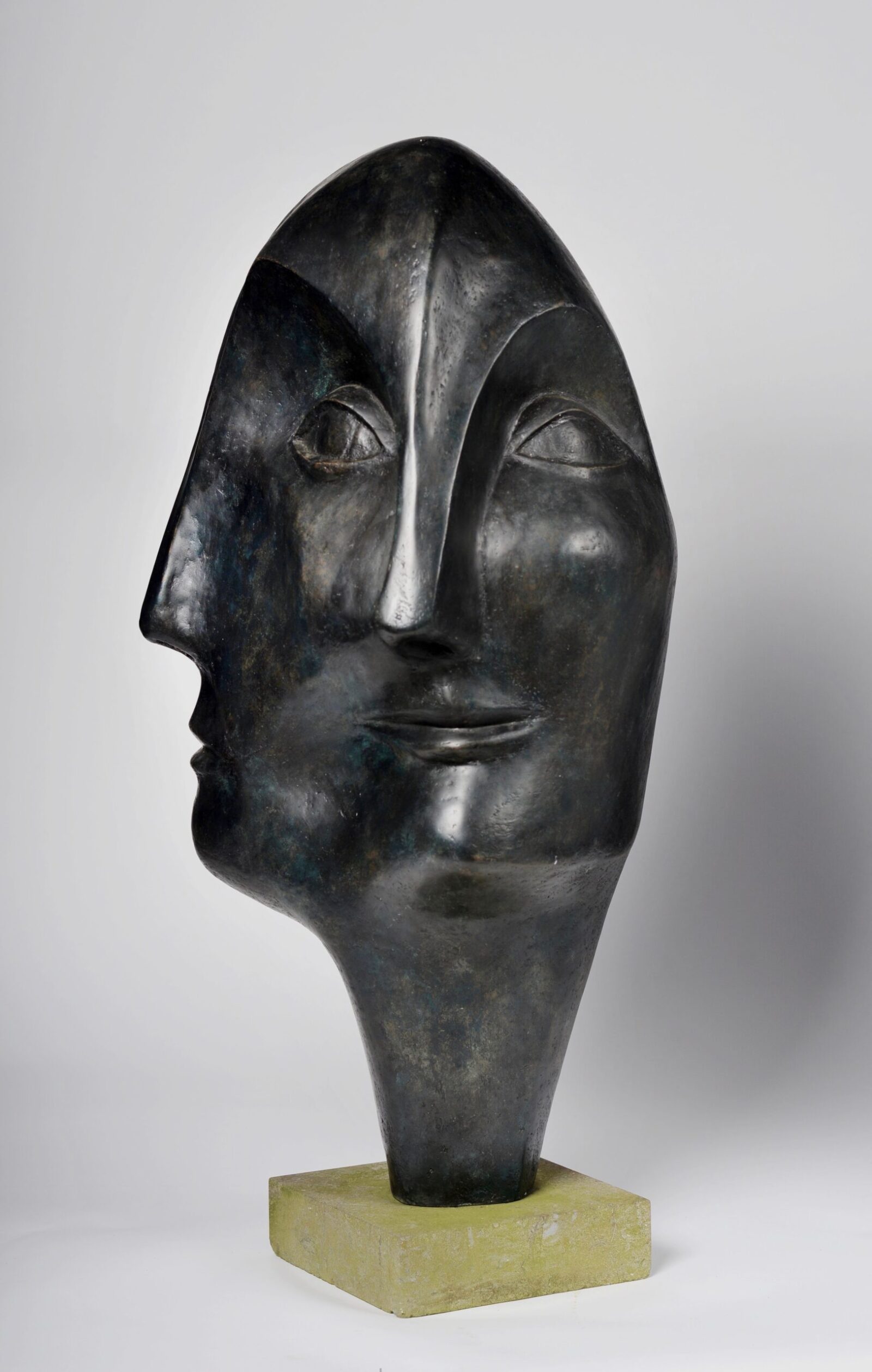 large contemporary garden bronze sculpture of a head based on Picasso