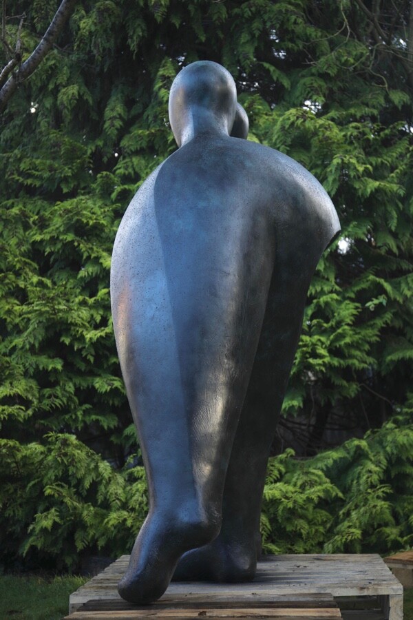 Large hospital commissioned bronze sculpture of two supportive figures