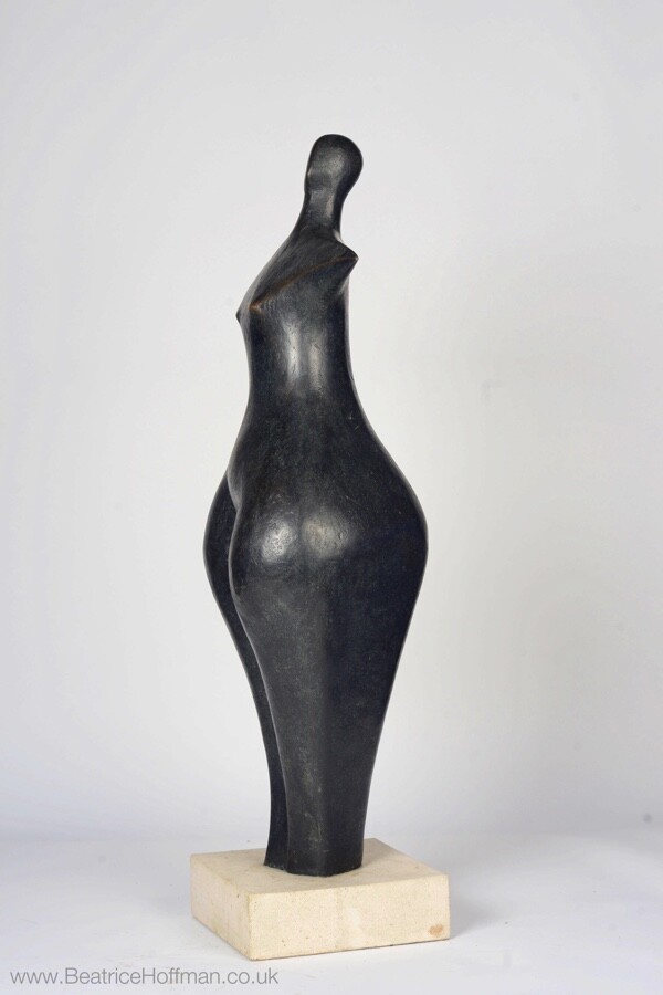 contemporary bronze sculpture of a standing abstract figure for garden or interior design