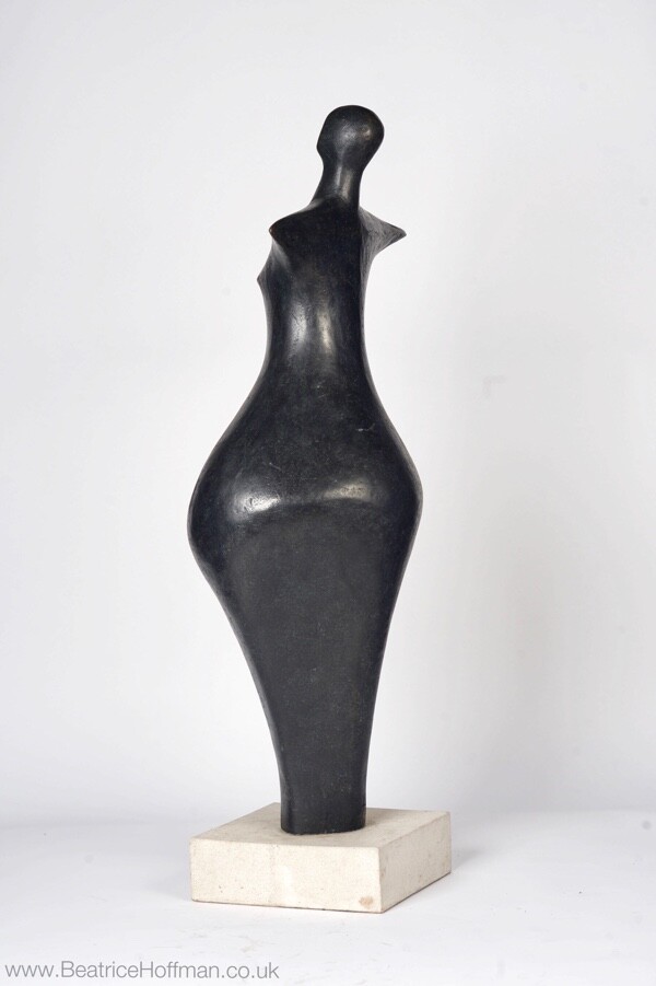 contemporary bronze sculpture of a standing abstract figure for garden or interior design
