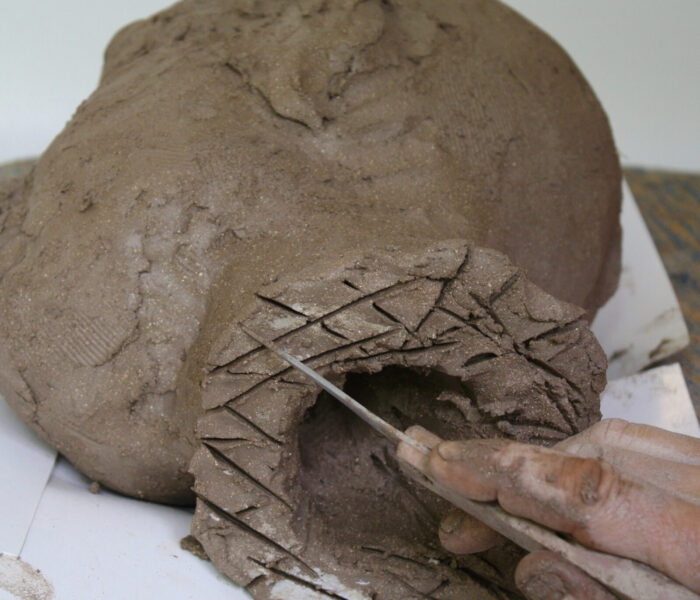 0006_EXTENDING NECK scouring surface of neck with knife