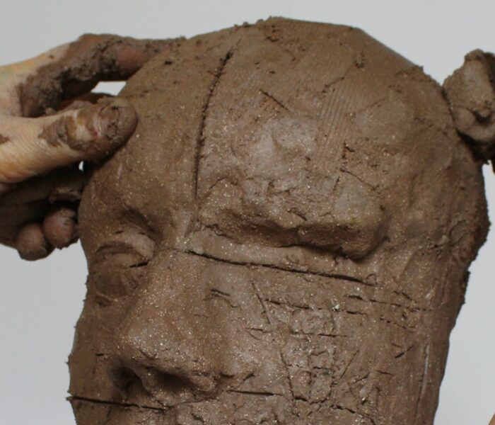 0086_27a). Adding clay to the left forehead with MKpxm