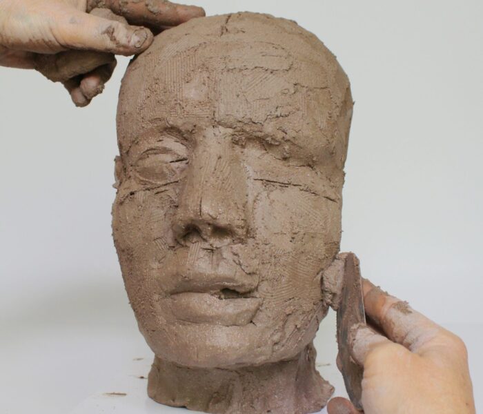 0105_31e) adding clay lower right cheek