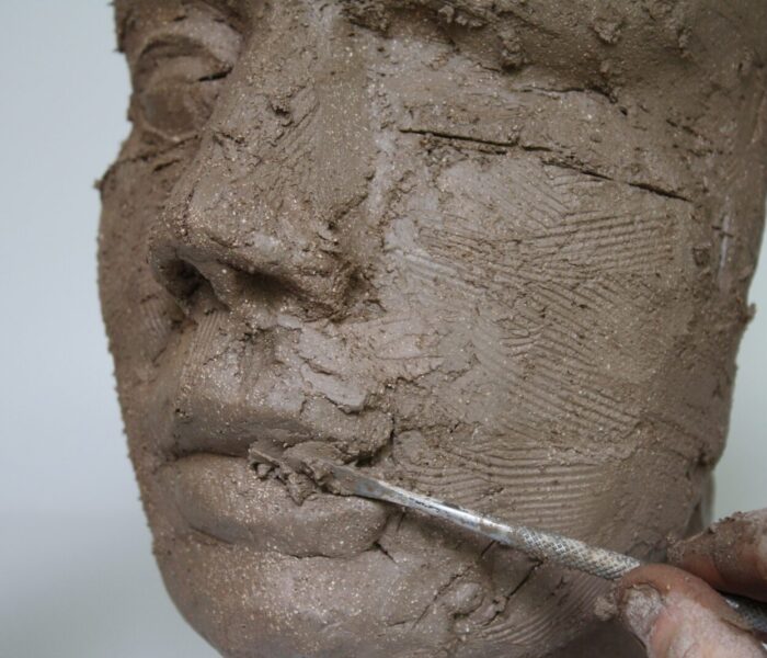 0135_42a) LIPS adding clay with dental tool building up width