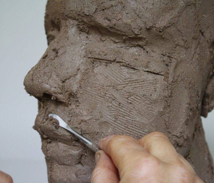 0159_57 philtrum area carving with dental tool